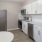Open kitchen and living room with plenty of natural light.